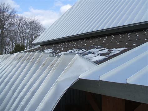 ice brackets on metal roofs to protect gutter|metal roof guards vs rails.